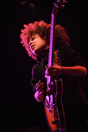Brandon performs with Lions On The Moon.